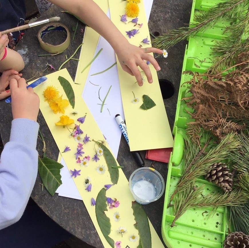 Children making collages of natural materials
