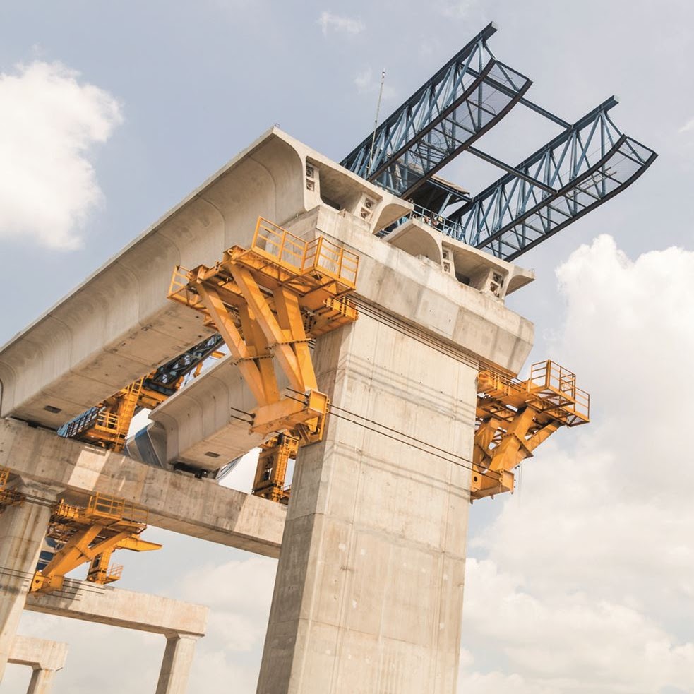 A bridge being built with heavy machinery