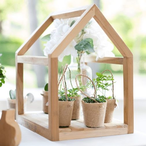 Potted plants inside a model of a building