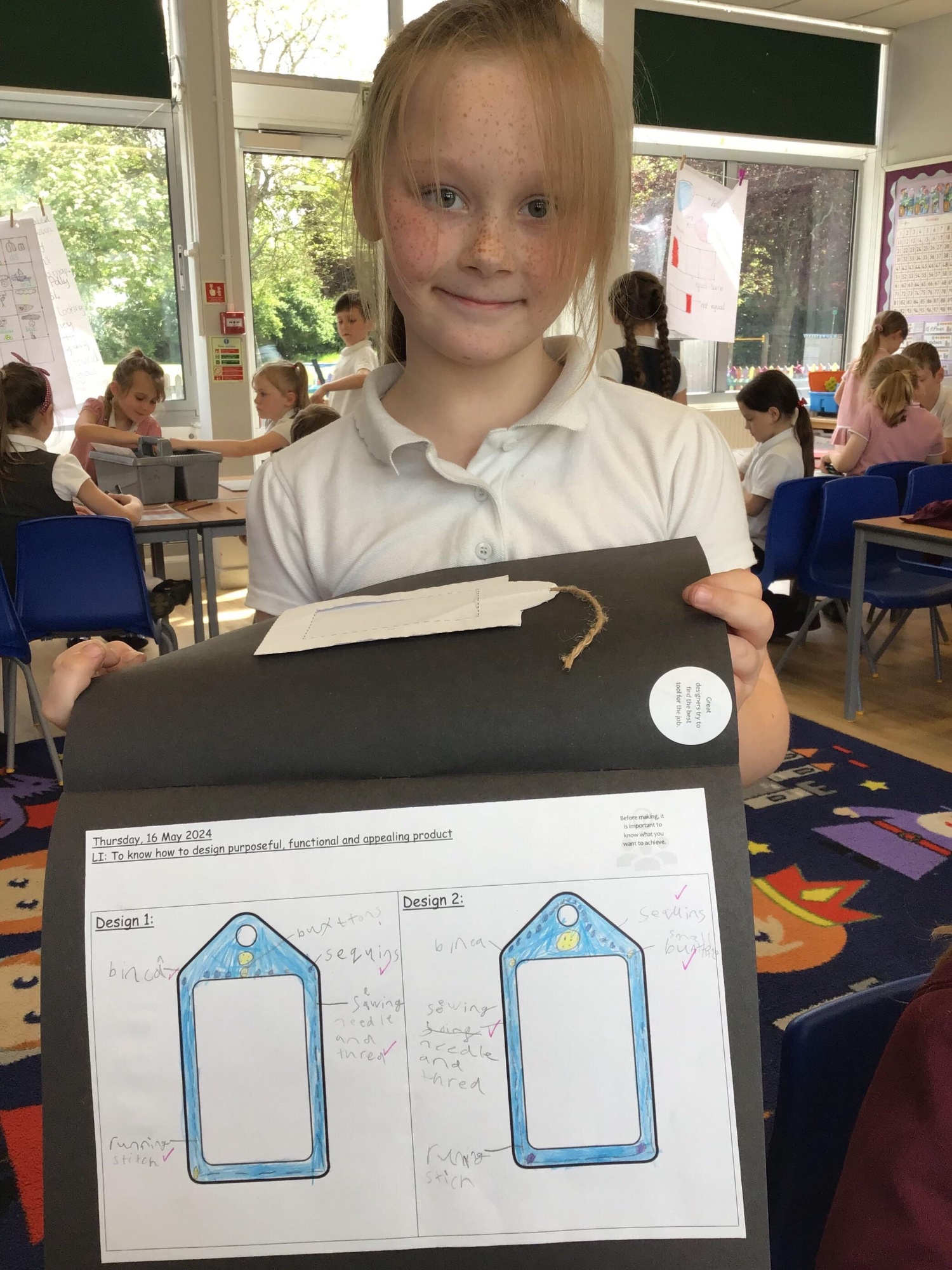 A girl showing her work on labels