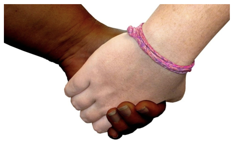 Two children holding hands